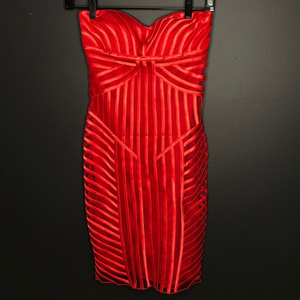 Red cache dress—never worn with tags